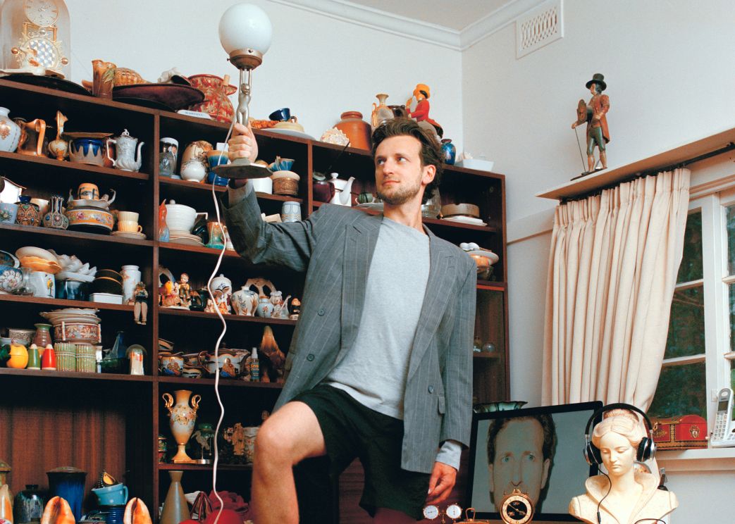 Image Harvey Sutherland holding a lamp